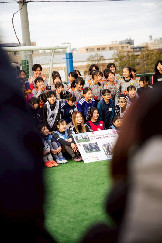 イベントボードを持った集合写真